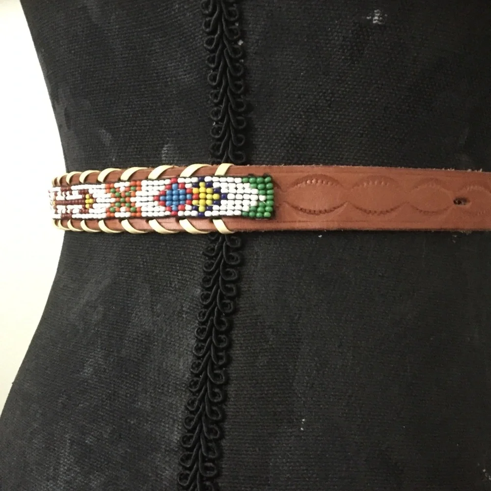 Vintage beaded belt size 26. Firebird design.